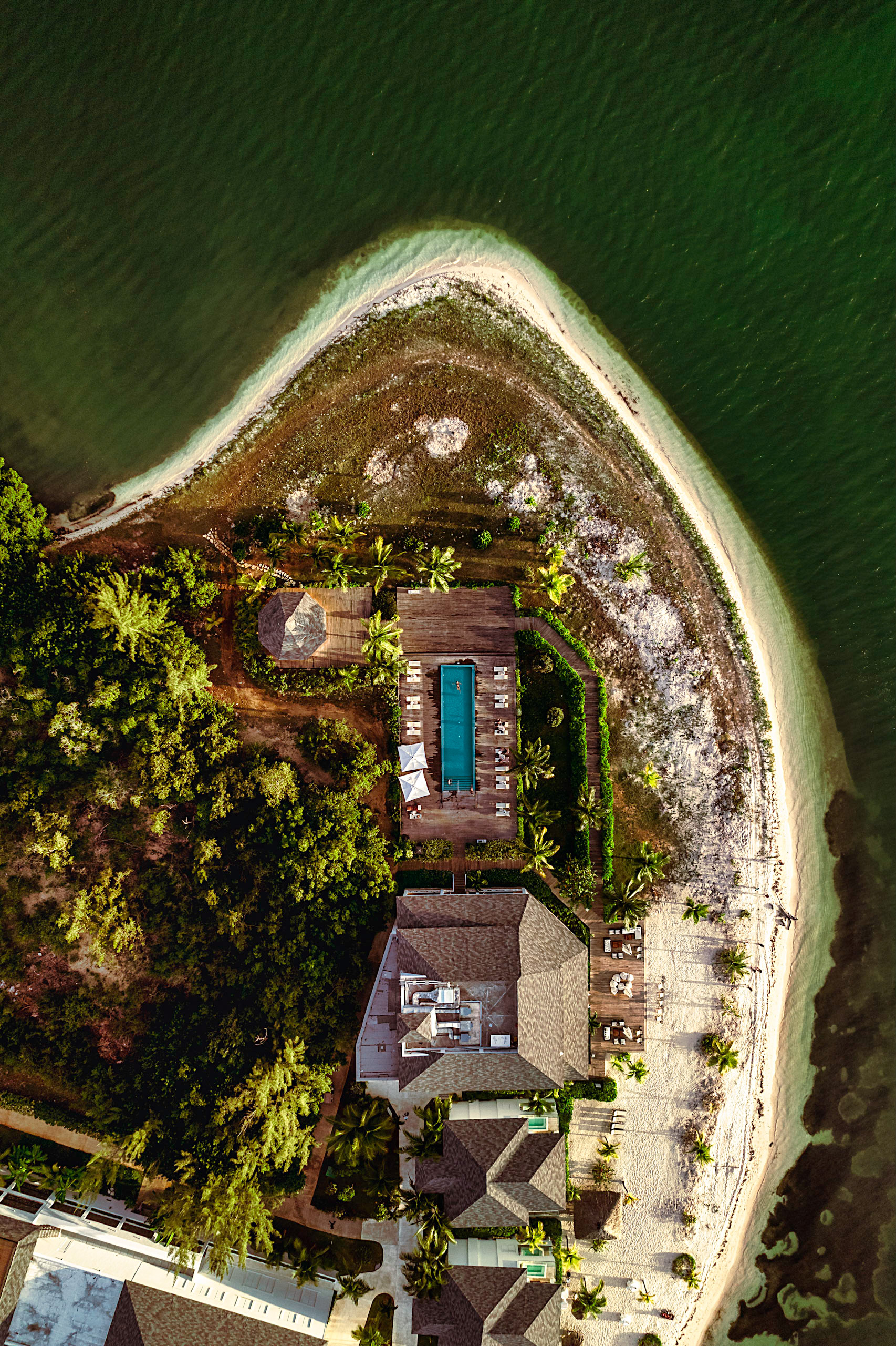 Overhead drone shot of pool on a beach in Jamaica
