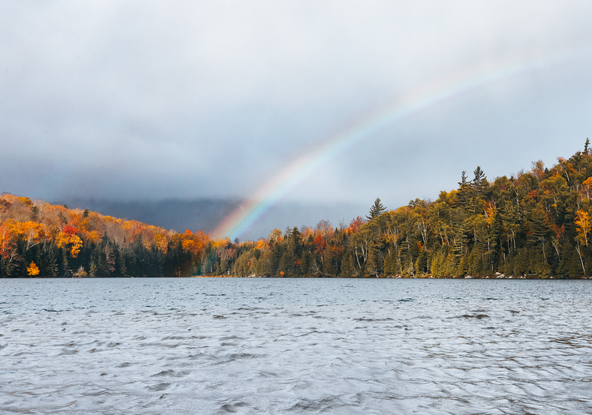 Heart Lake rainbow among fall foliage