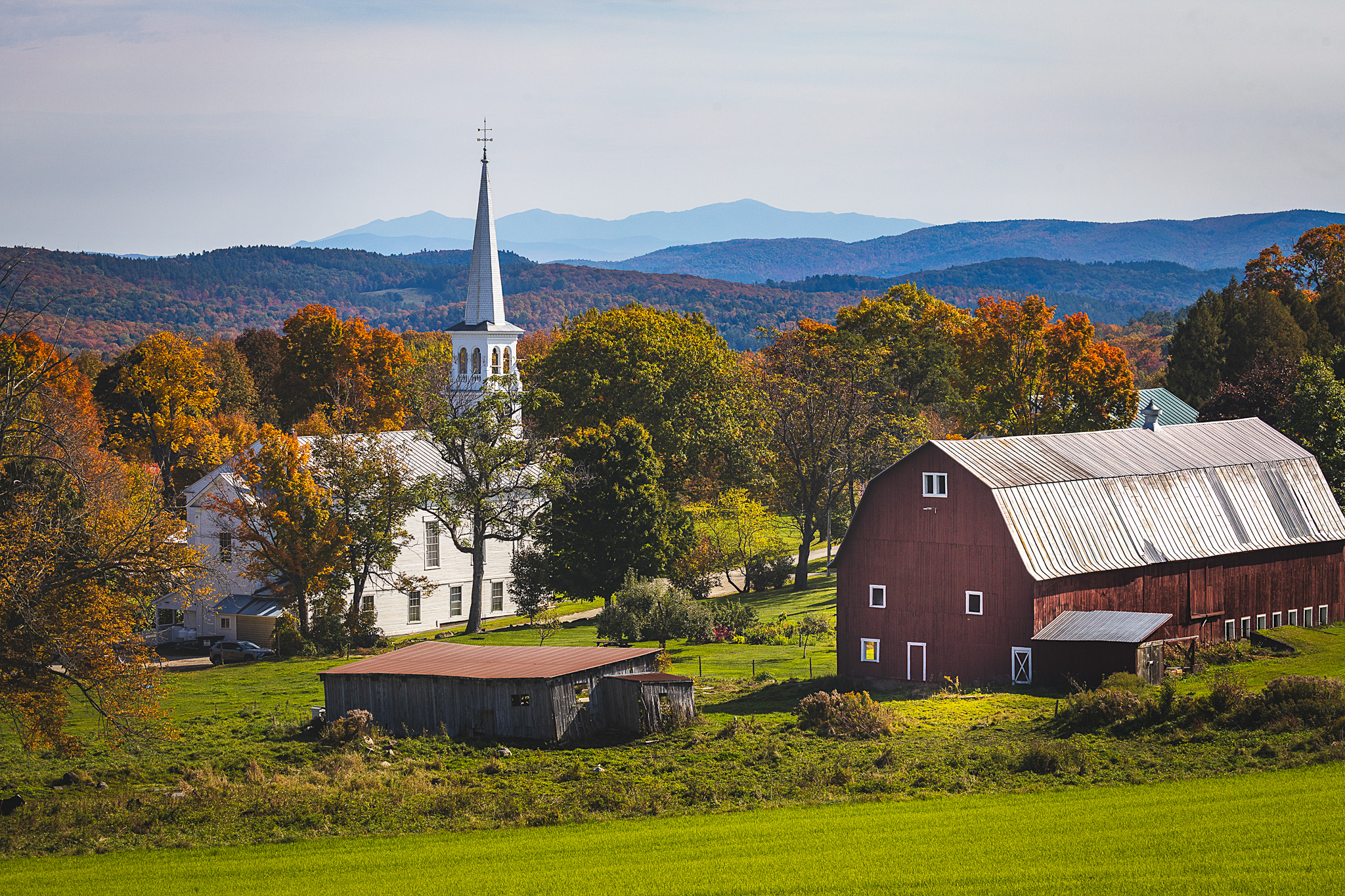 A white church and red barn of Peacham, Vermont