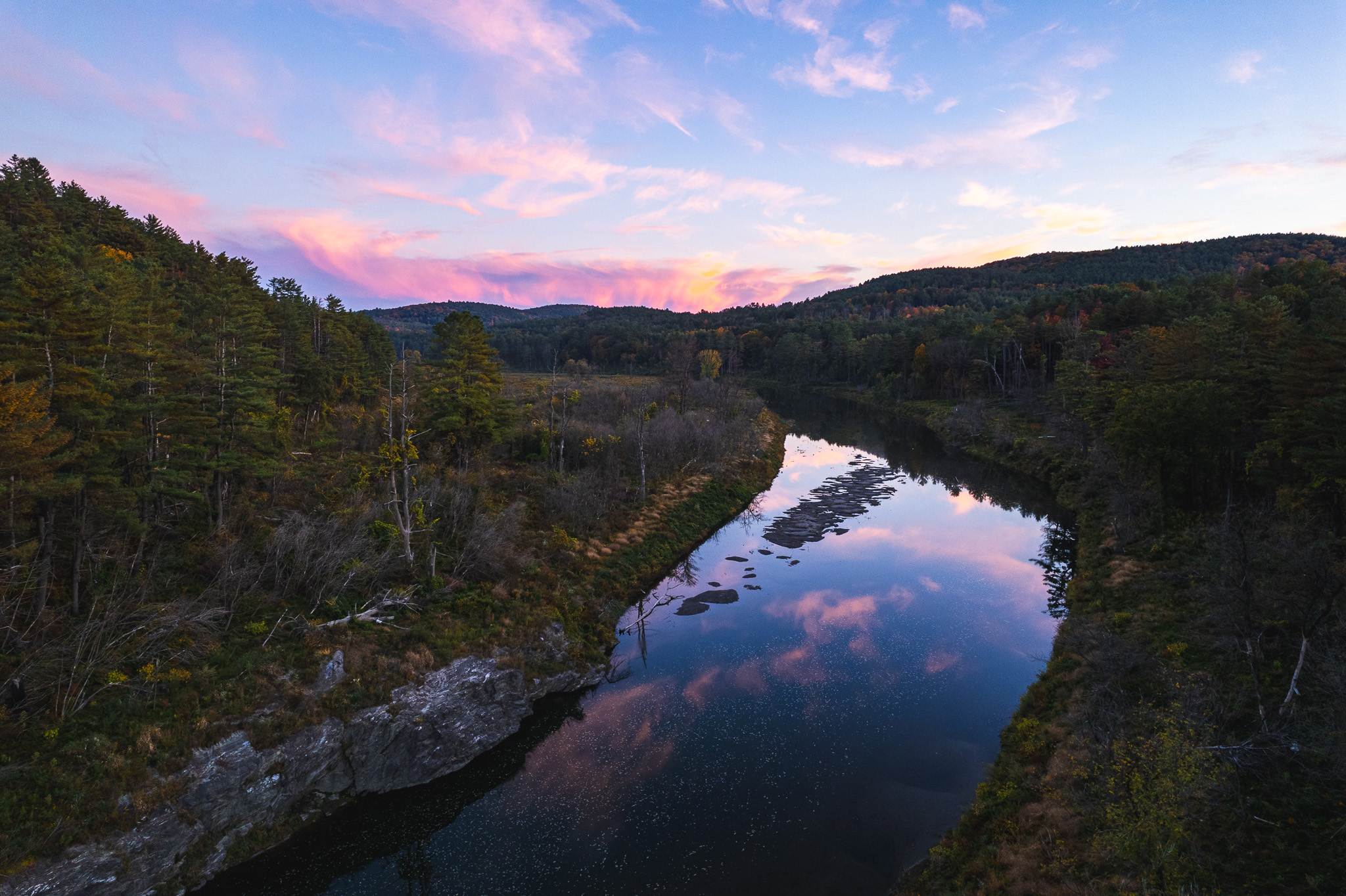 Sunset from above, reflecting in the water of Quechee Gorge