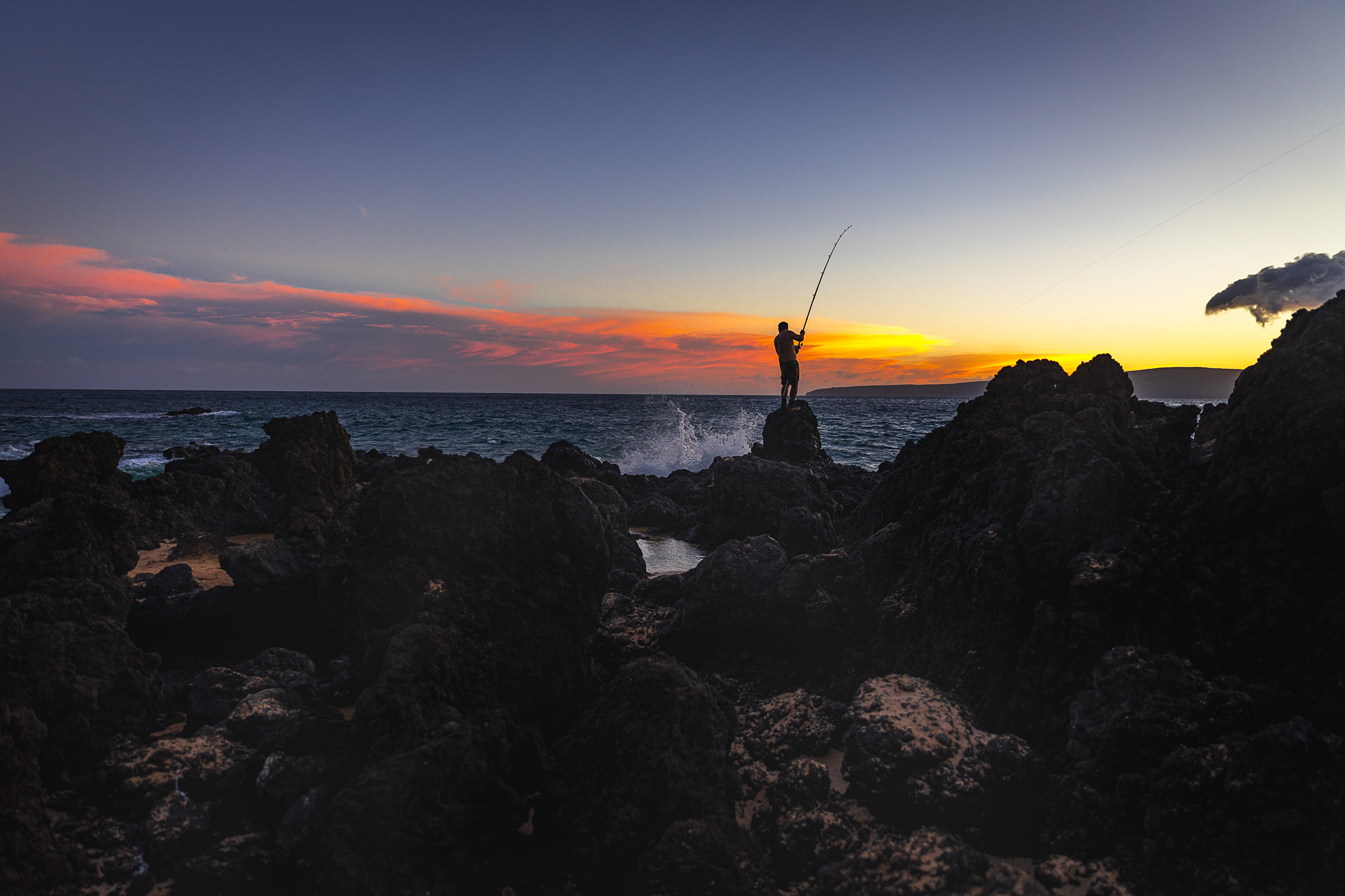 A Maui fisherman at sunset