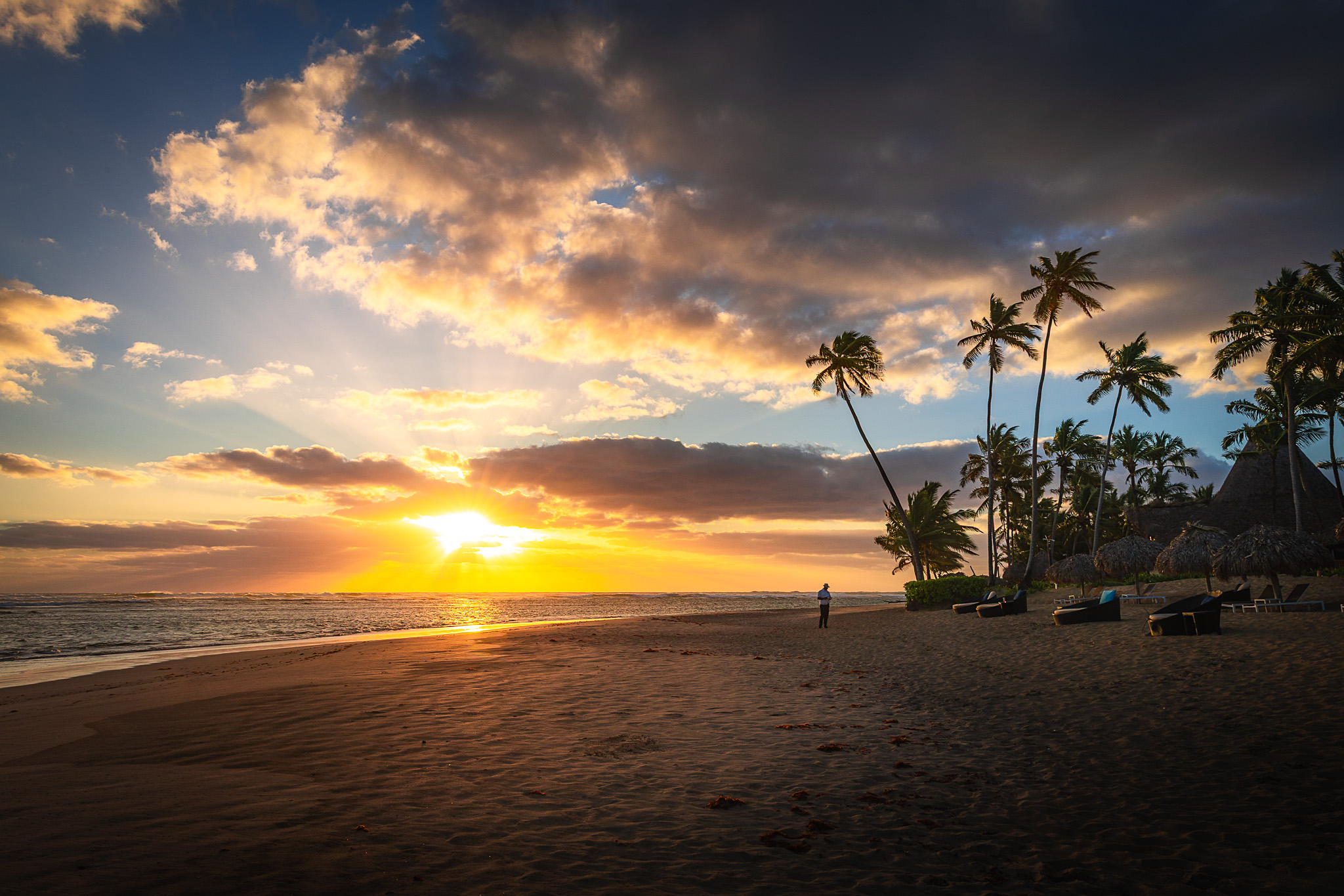 Sunrise on the beach with palm trees