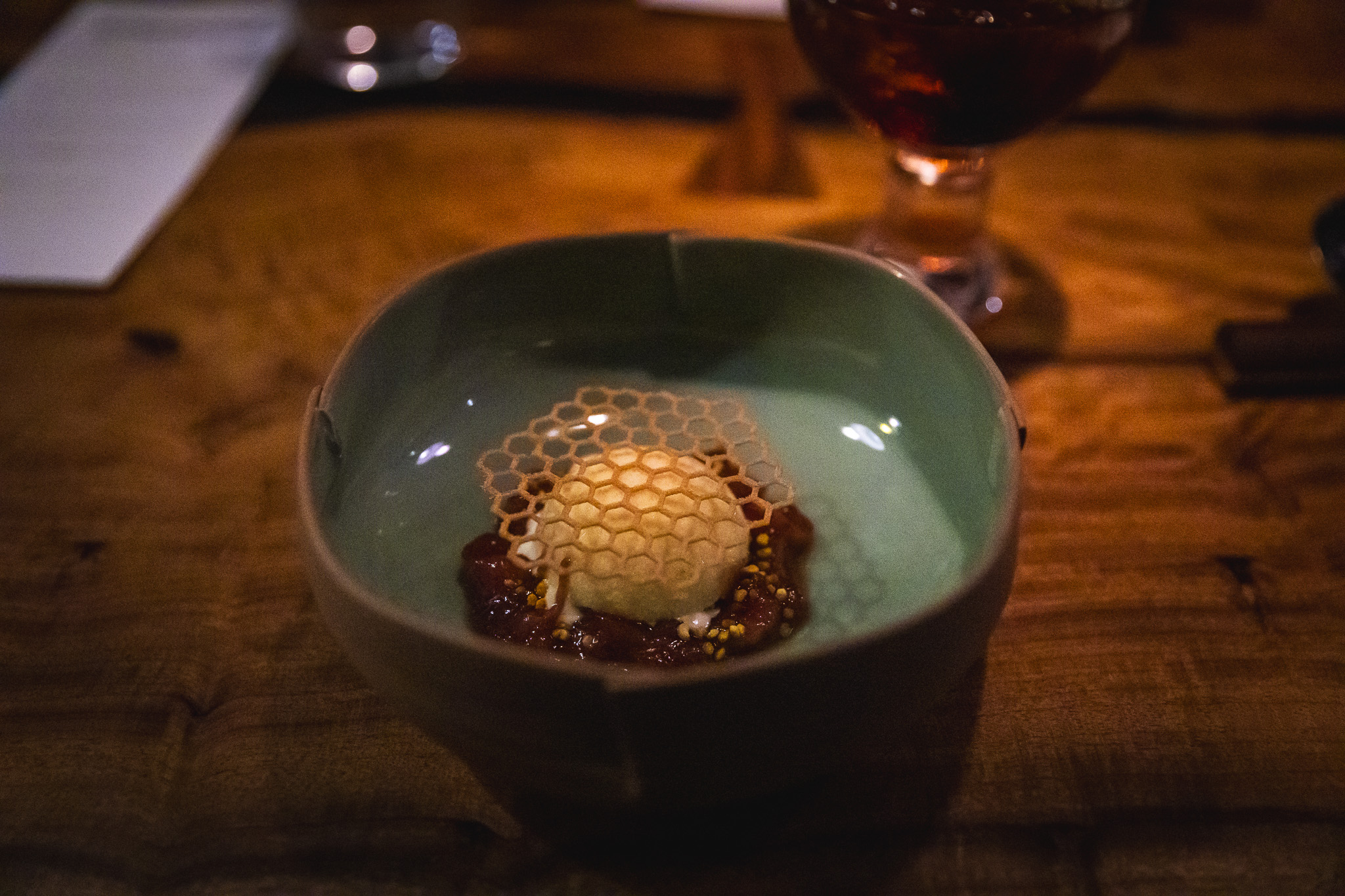 Ice cream on compote with a tuile