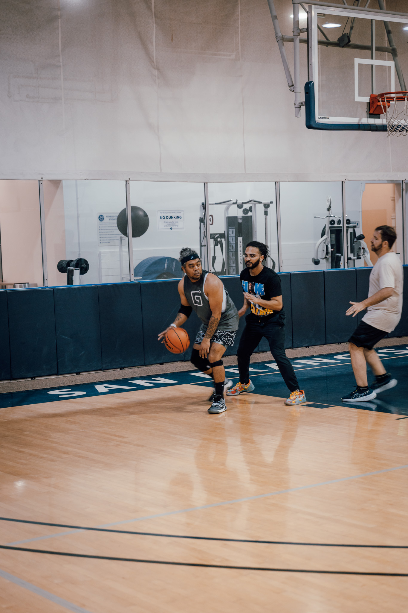 Dan Mall guarded by a defender