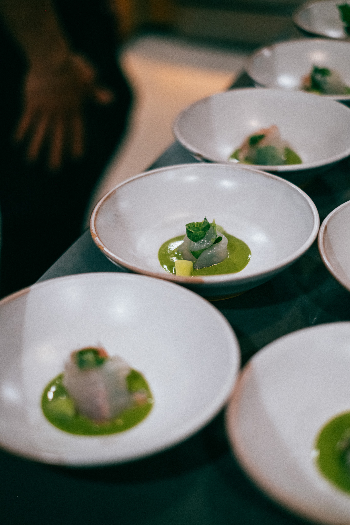 A line of plates ready to be served