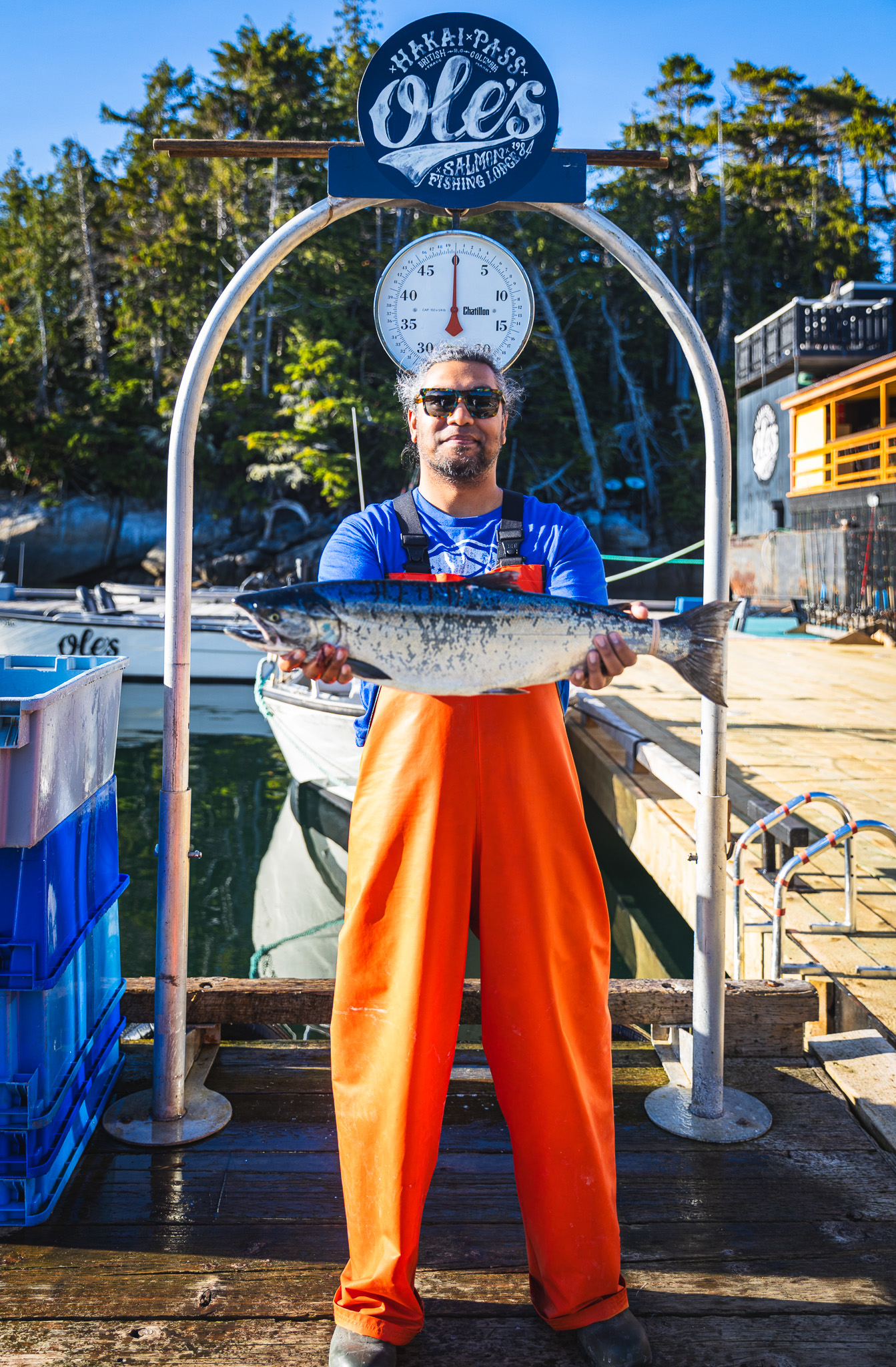 Dan Mall holding a salmon he caught